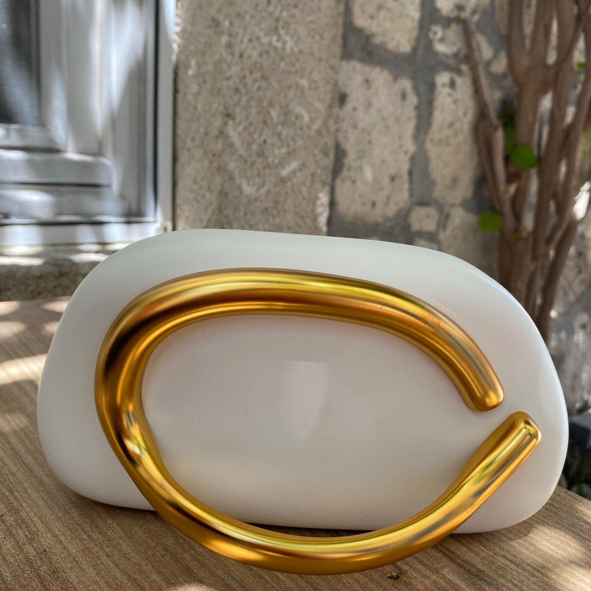 The Ivory Halo Clutch