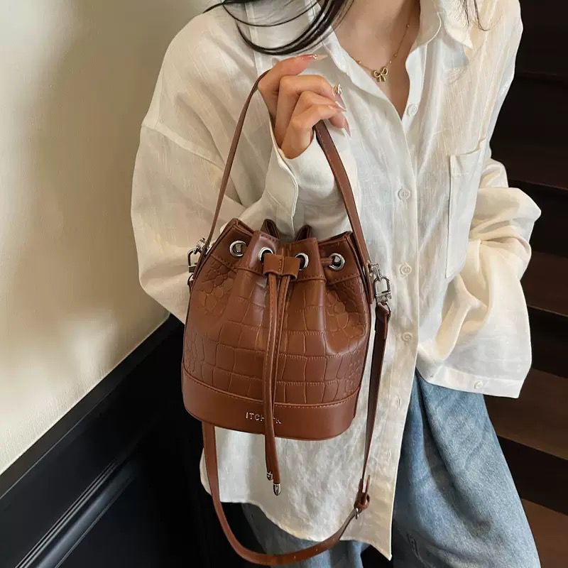 The Ivory Muse Bucket Bag