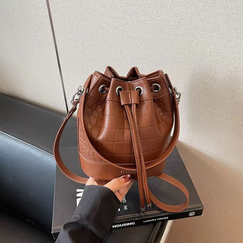 The Ivory Muse Bucket Bag