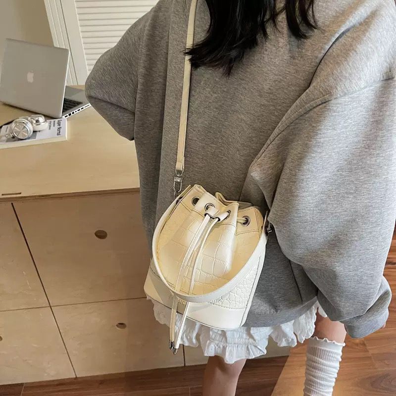 The Ivory Muse Bucket Bag