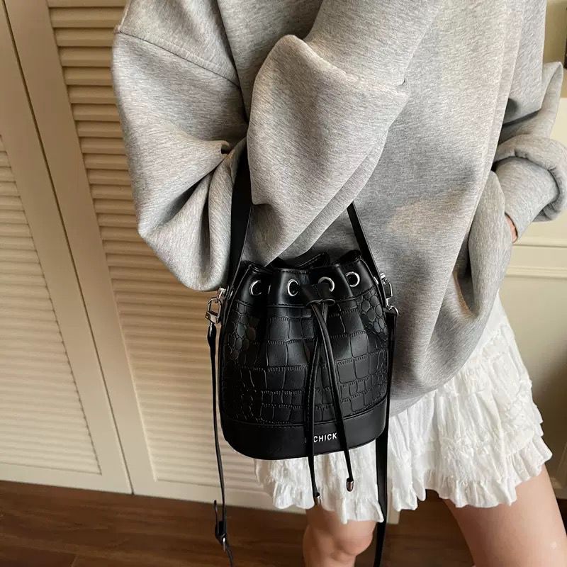 The Ivory Muse Bucket Bag